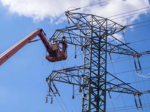 Maintenance of high voltage lines Stock Photos