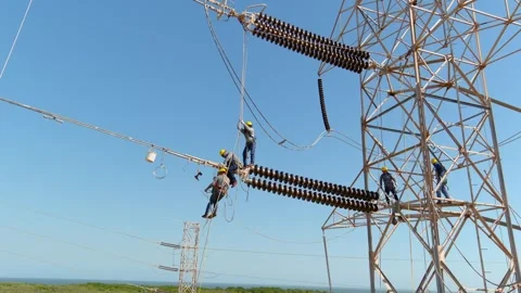 Maintenance of high-voltage utility cable power transmission infrastructure Stock Footage 341097891