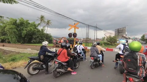 Maintenance Lorry Passing Through a Railroad Crossing,Malang, East Java Stock Footage 129059482