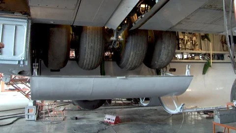 Maintenance of main chassis of Il-76 transport aircraft. Close-up. Video stock 108428796