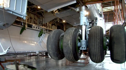 Maintenance of main chassis of Il-76 transport aircraft. Close-up. Stock Footage 108428870
