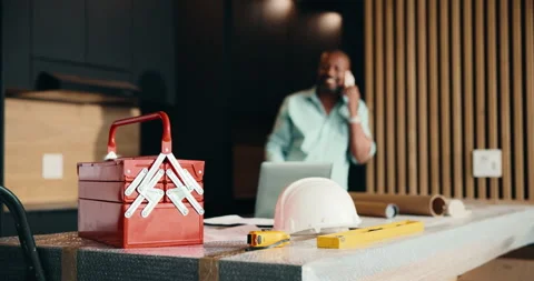 Maintenance, phone call and toolbox with black man in kitchen for home Stock Footage 337760016