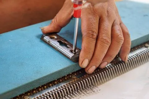 Maintenance process of a traditional weaving loom or knitting apparatus Stock Photos