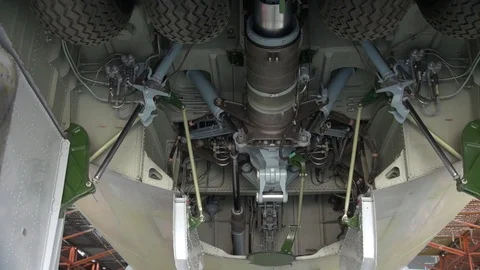 Maintenance of the Russian IL-76 (NATO: Candide). Release front landing gear. Stock Footage 124191713