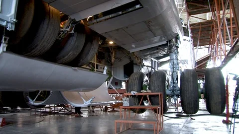 Maintenance of tmain chassis of Il-76 transport aircraft. Stock Footage 108428832