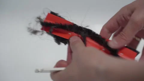 Maintenance of the vacuum cleaner robot 库存影片 336513243