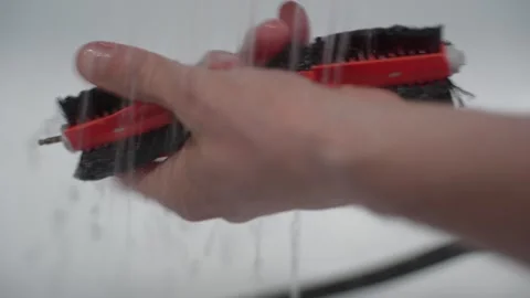 Maintenance of the vacuum cleaner robot 库存影片 336513275