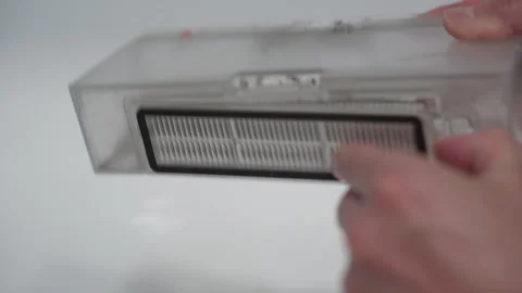 Maintenance of the vacuum cleaner robot 库存影片 336513460