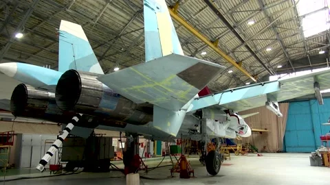 Maintenance of wing mechanization systems and stabilizer of Su-33 fighter. Stock Footage 134546602