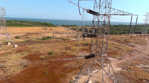 Maintenance work field technicians repair high-voltage line transformer Stock Footage 341098285