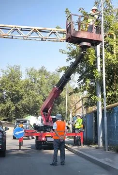 Maintenance work at height using a boom lift 스톡 사진