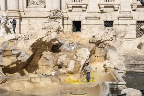 Maintenance work inside the empty Trevi Fountain basin Stock Photos