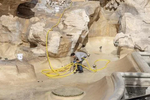 Maintenance work inside the empty Trevi Fountain basin Stock Photos