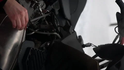 Maintenance Work on a Snowmobile Engine A Comprehensive Guide for Enthusiasts Stockbeeldmateriaal 314044871