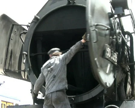 Maintenance work on steam engine Stock Footage 118049