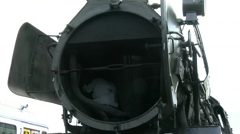 Maintenance work on steam engine Stockbeeldmateriaal 131146