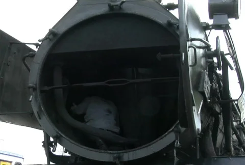 Maintenance work on steam engine Stock Footage 131147