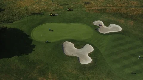 Maintenance workers clear golf course, aerial Video stock 73810194