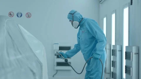 Maintenance workers painting the car Stock Footage 270338038