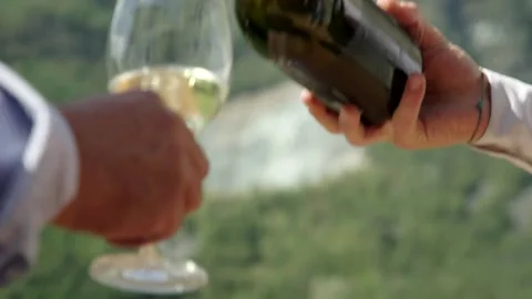The maître pours the champagne Stock Footage 167700947
