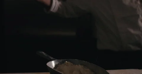 Maitre throws flour on the counter Stock Footage 171175100