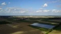 Maize fields and corn fields farmland landscape drone shot timelapse sunny day 4k or 4k+ Resolution