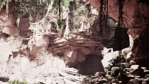 Majestic Cave Adorned With Lush Greenery and Ancient Rock Formations Stock Footage 344926751