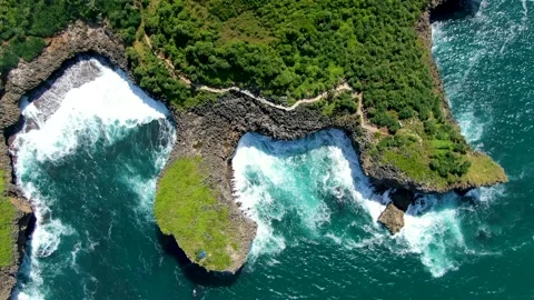 Majestic cliff shoreline of Java, Indonesia, Kesirat Beach aerial top view Stock Footage 152815078
