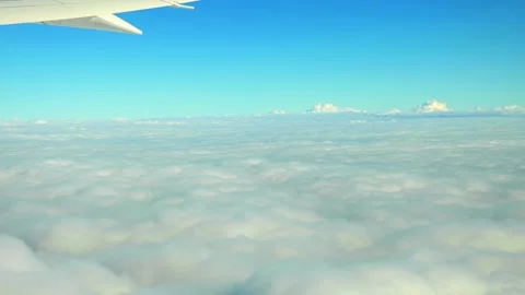 Majestic cloudscape slowly drifting over a vibrant blue sky in 4k slow moti.. Stock Footage 281079414