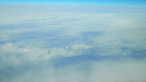 Majestic cloudscape slowly drifting over a vibrant blue sky in 4k slow moti.. Stock Footage 281079649