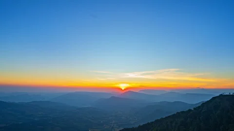Majestic Highlands Under a Dramatic Sunset Sky Stock Footage 328568621