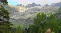 Majestic mountain landscape, stream flowing down slope, nature HD Footage