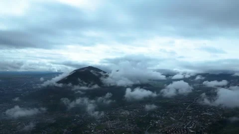 Majestic Mountain Peak Emerging from Clouds 動画素材 333375617