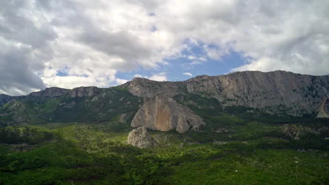 A Majestic Mountain Range Embraced by Dramatic Clouds 動画素材 257187412