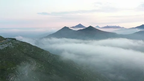 Majestic Mountain Range stretching into infinite Horizon at Twilight Stock Footage 124682845