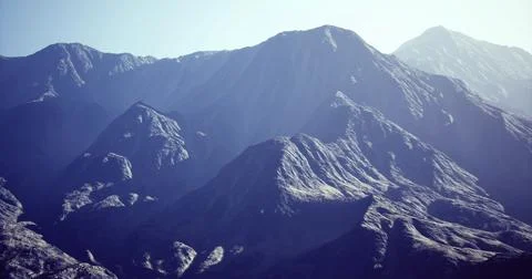 Majestic mountain range under clear sky during day time Stock Illustration