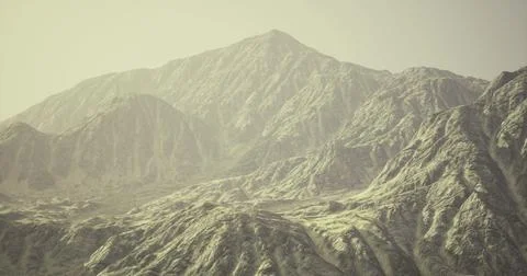 Majestic mountain range under soft sunlight in a serene landscape Stock Illustration