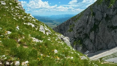 Majestic mountain ridge slopes down into deep valley. Savin Kuk peak, Montenegro Stock Footage 342979886