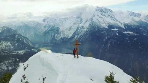 Majestic Mountain View with Snow-Capped Peaks and Cross Stock Footage 323301981