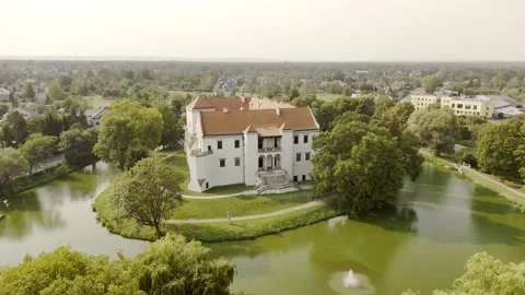 Majestic Polish Castle Surrounded by a Tranquil Lake Stock Footage 287453056