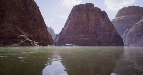 Majestic rock formations reflected in tranquil waters at a stunning canyon Stock Illustration