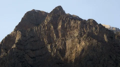 Majestic rock in the rays of the setting sun Video stock 85599130