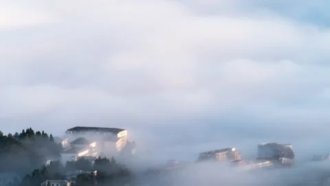 Majestic Sea of Clouds Rolling Over Mountain Peaks Time-lapse Stock Footage 326706371