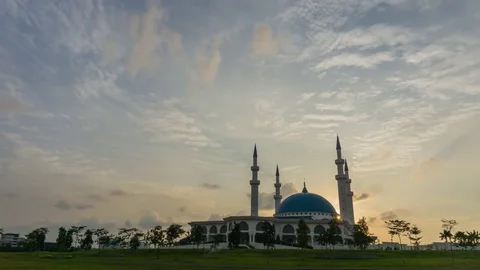 Majestic Sunset with ray of light until blue hours over the mosque as  forground Stock Footage 77200288