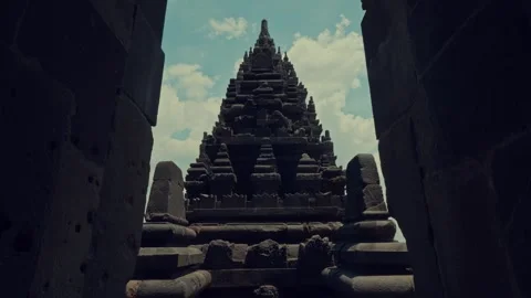 Majestic Temple Tower Framed Through Dark Stone Window Stock Footage 333325778