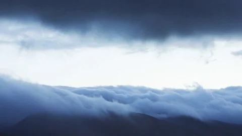Majestic Timelapse Shot Of Clouds Rolling In Fast-Motion On Mountain Stock Footage 70800989