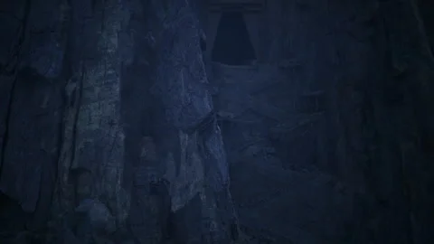 Majestic underground chamber featuring towering pillars and glowing blue light Stock Footage 341559943