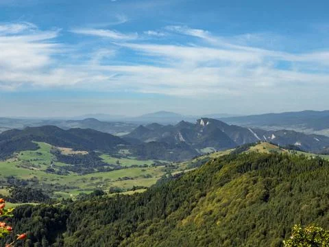 Majestic view of Trzy Korony covered in trees and fields, Pieniny, Lesser Poland Stock Photos