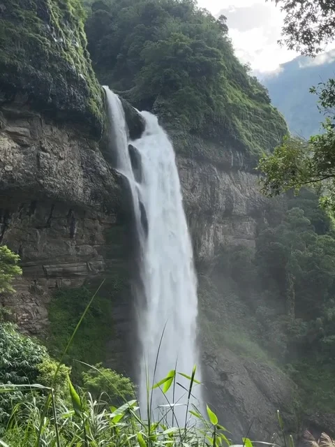 Majestic Waterfall Flowing Down Stepped Mountain Cliff Stock Footage 341320313