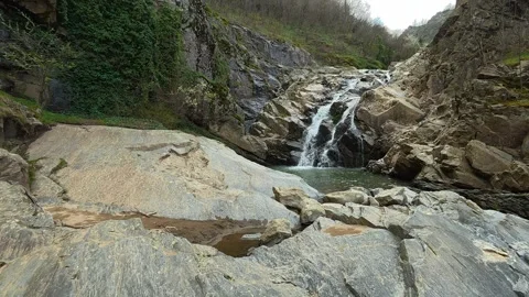 Majestic Waterfall Low Angle - Powerful 4K Nature Flow for Spiritual Awakening Stock Footage 332145896